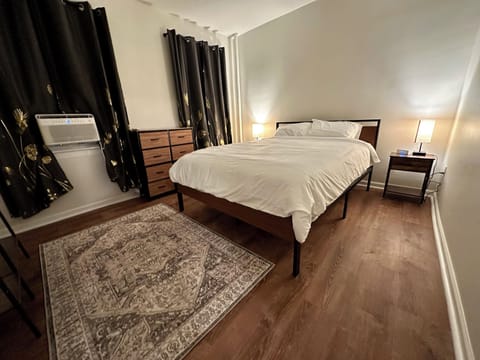 Bedroom, Queen Dreamcloud mattress, alarm, sound machine, wardrobe.