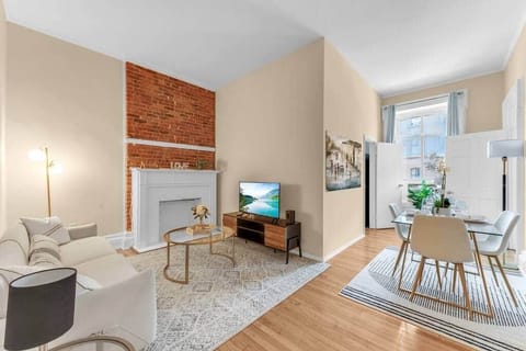 Living room & dining area with natural light