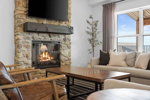 Cozy in by the fireplace with our upscale furniture! 