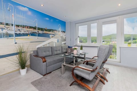 Comfortable, fold-out sofa in the living room.