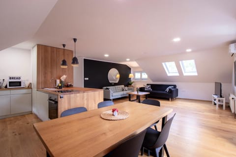 Living room - open space with a dining area and a kitchen