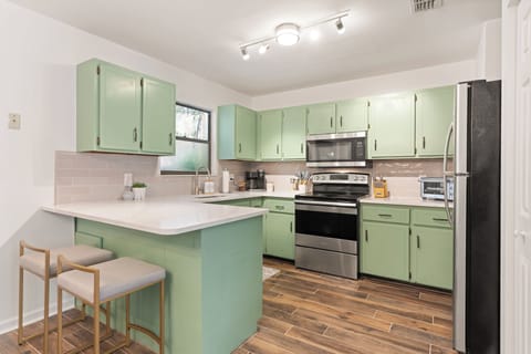 Fully stocked kitchen with Keurig (some coffee included), spices, Alexa speaker