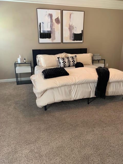 The primary bedroom boasts a large closet, ceiling fan, and attached bathroom. 