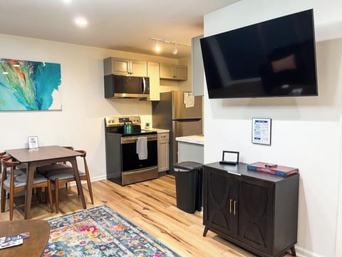 Start your mornings right with our complimentary selection of coffee and There's a coffee maker and a kettle available for your use. We've stocked the kitchen with a comprehensive set of cookware, including pots, pans, baking trays, and various cooking utensils. You'll find everything you need to whip up a feast.