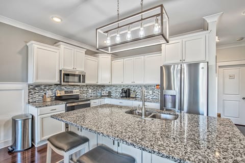 Fully Stocked Kitchen with Stainless Steel Appliances.