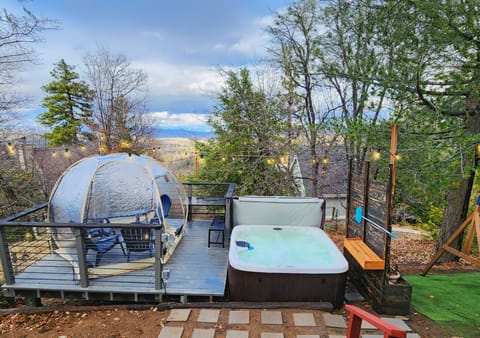 Jacuzzi and clear dome tent.