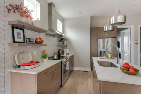 Fully Stocked Kitchen with Modern Appliances and Ample Storage