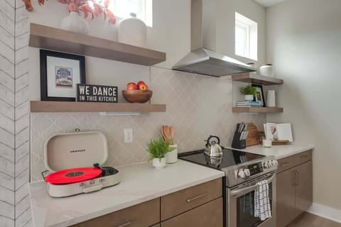 Fully Stocked Kitchen with Modern Appliances and Ample Storage