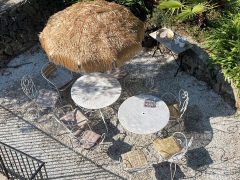 Outdoor dining area next to pool
