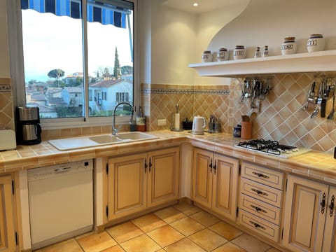 Upstairs kitchen, with dishwasher, microwave, oven & hob, kettle, coffee machine