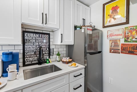 The fully functional kitchen is a chef's delight, equipped with all the essentials for creating delicious meals.