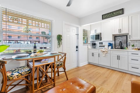 The table, crafted with a blend of elegance and practicality, provides a comfortable setting for a more personal dining experience.