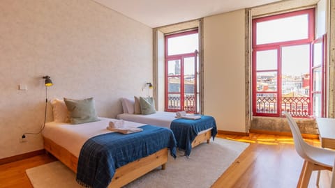 Tranquil and cozy bedroom featuring 2 single beds, a small desk for work or study, and a serene ambiance, perfect for rest and relaxation.
#bedroom #elegance