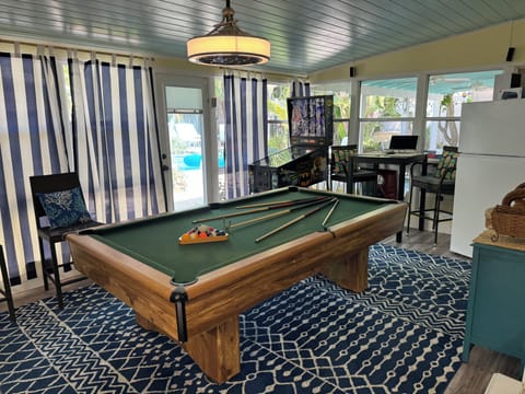Game Rm looks out to pool & covered deck, regulation billiards, arcade pinball.