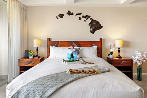 Rest easy in the inviting king-size bed, beautifully appointed with Hawaiian-inspired décor and designed for a peaceful night's sleep after your Maui adventures.