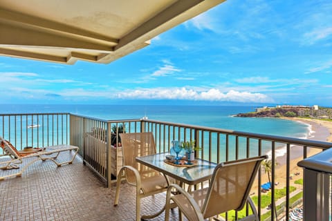 Expansive oceanfront lanai offering breathtaking panoramic views, comfortable outdoor seating, and the perfect setting to relax, dine, and enjoy the beauty of the coastline.