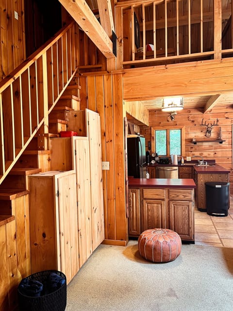 Enjoy the open-concept design where the living room flows seamlessly into the kitchen—perfect for gathering, relaxing, and staying connected.