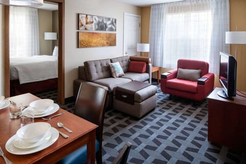Spread out in a spacious suite with cozy lounge seating.