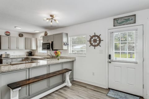 The island has a huge bench to entertain while cooking