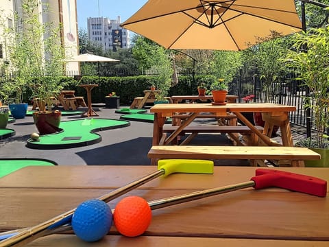 Play mini-golf outside, then linger at shaded picnic tables.