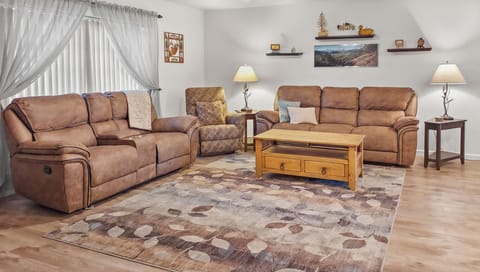 Spacious living room with open design to kitchen area