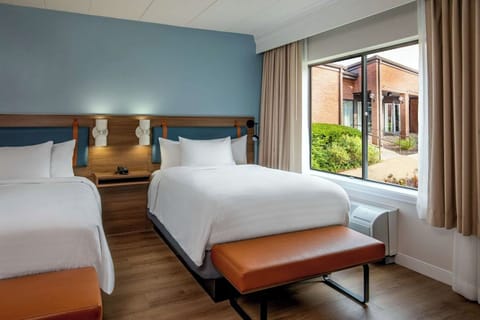 Settle in comfortably with two plush beds and natural light.