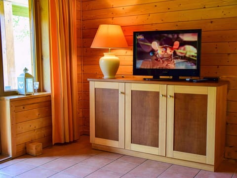 Property, Furniture, Cabinetry, Wood, Lighting, Building, Home Appliance, Television Set, Interior Design, Television