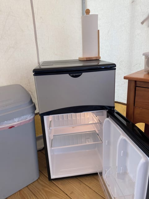 Yes, a refrigerator is available in your tent!