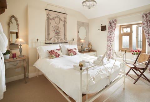 First floor:  The bedroom with a 5' king-size bed and rear views of the stunning countryside and deer park