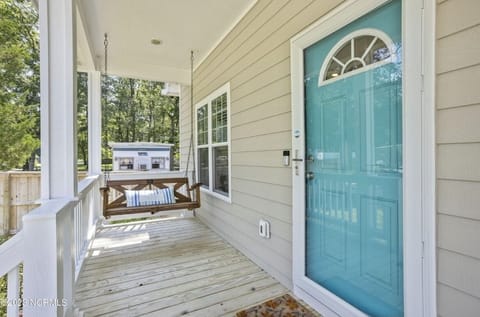Front porch with swing.