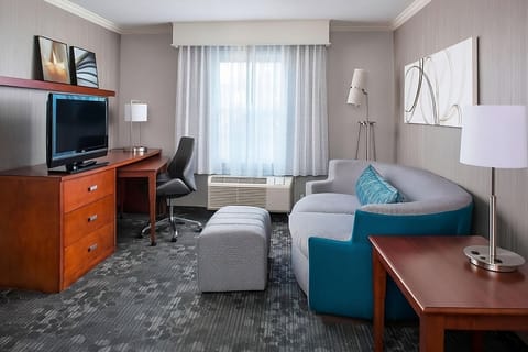 Unwind on the plush sofa after work at the desk