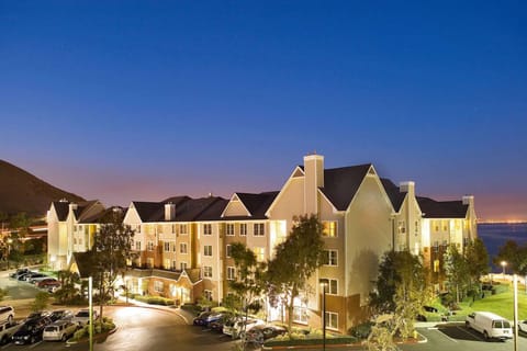 Arrive to a beautifully lit property with evening curb appeal.