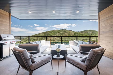 Private covered deck with stunning mountain views