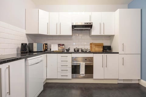 Whether you're cooking or sipping coffee, this kitchen is a cozy gathering spot.