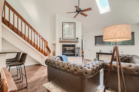 Living Room - Fireplace, Skylight, and Ceiling Fan
