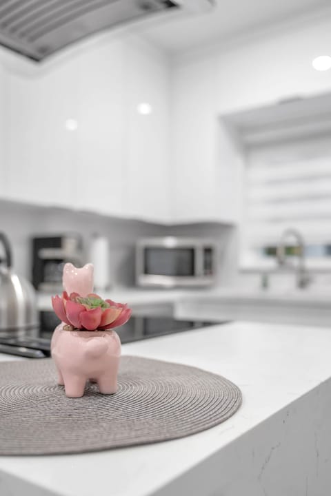 The unit is adorned with carefully selected tasteful decor and paintings.