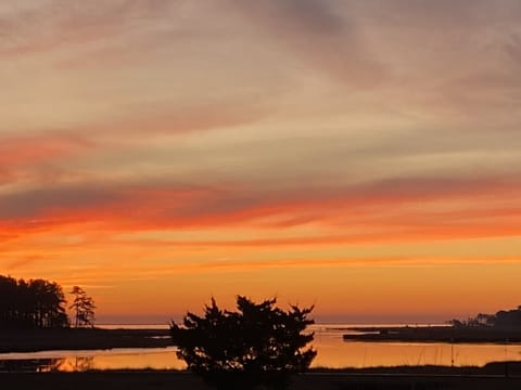 Sunset over Love Creek. Stunning view from every room!