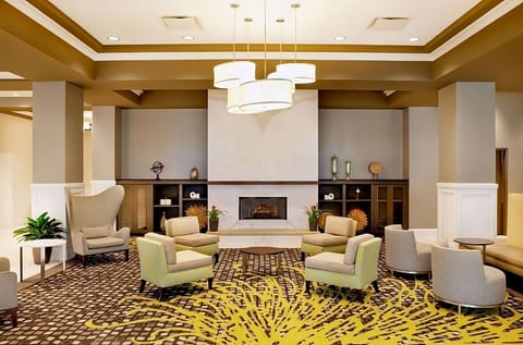Unwind by the fireplace in a cozy conversation lounge.
