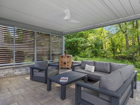 Enjoy a shaded happy hour beneath this state-of-the-art pergola 