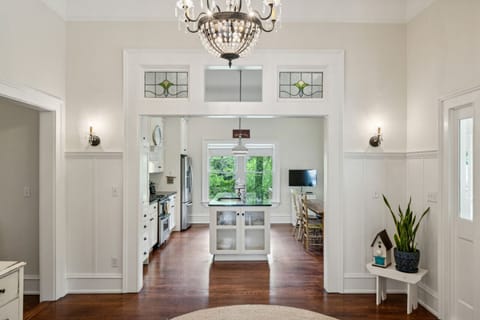 Entrance way looking into kitchen and breakfast room