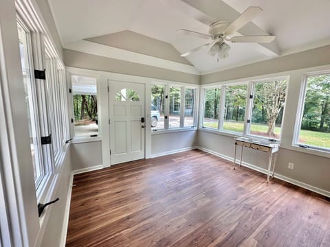 Sunroom / rear entry. Table and chairs being added for eating or games! 
