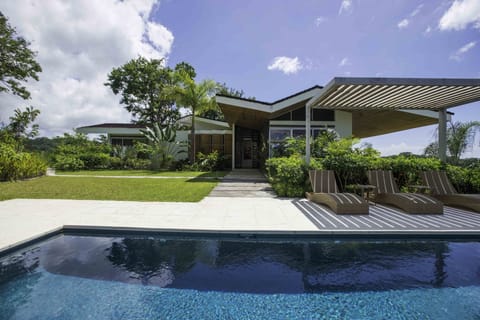 View from pool towards the house entrance. 