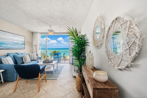 A bright and comfortable living room designed for relaxing, spending time together, and enjoying the laid-back island lifestyle.
