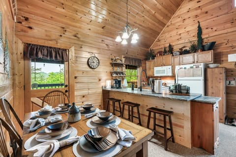 Room for 6 for sit down meals. Full size appliances and pantry for your items!