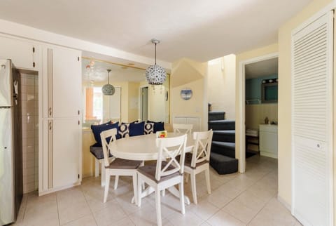 Happy Hours I dining area and kitchen