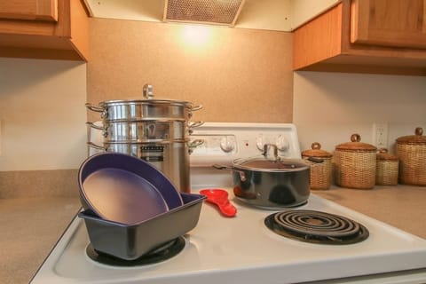 Stay at the best Airbnb in  Ocean Springs! The fully equipped kitchen has all the essentials for home-cooked meals and offers ample storage space, making it ideal for long-term stays. Enjoy comfort and convenience during your stay!