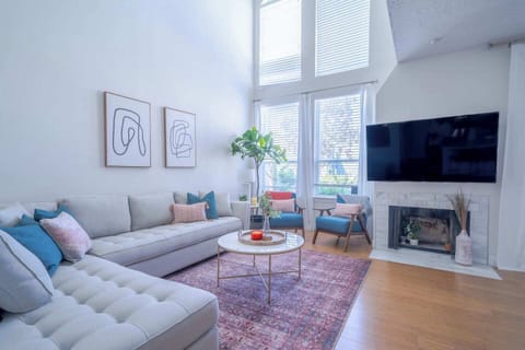 Catch up on your favorite shows or settle in for a game night in this cozy, connected hub.