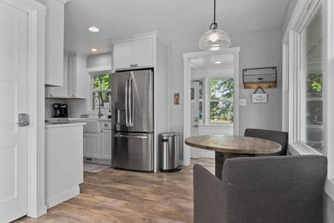 The entire lake house is well lit by natural light and modern light fixtures.