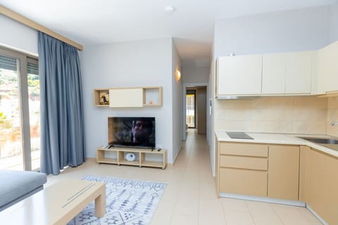 Living room and fully-equipped kitchen