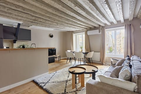 Salon avec canapé lit